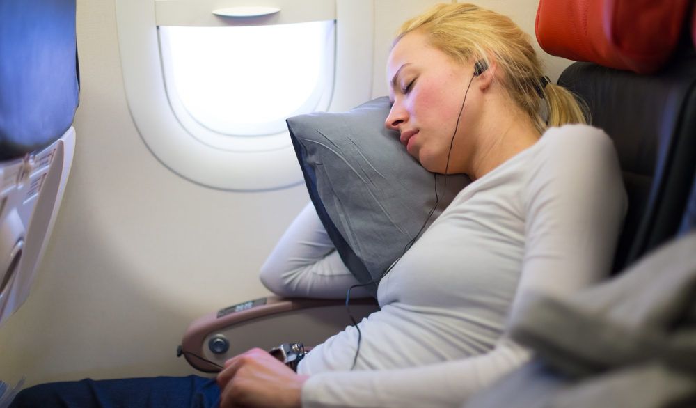 Ways to sleep better in flights 