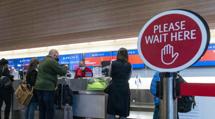 COVID-19 second wave: Revision of travel restrictions Travelers At SFO Airport Ahead Of Christmas Holiday